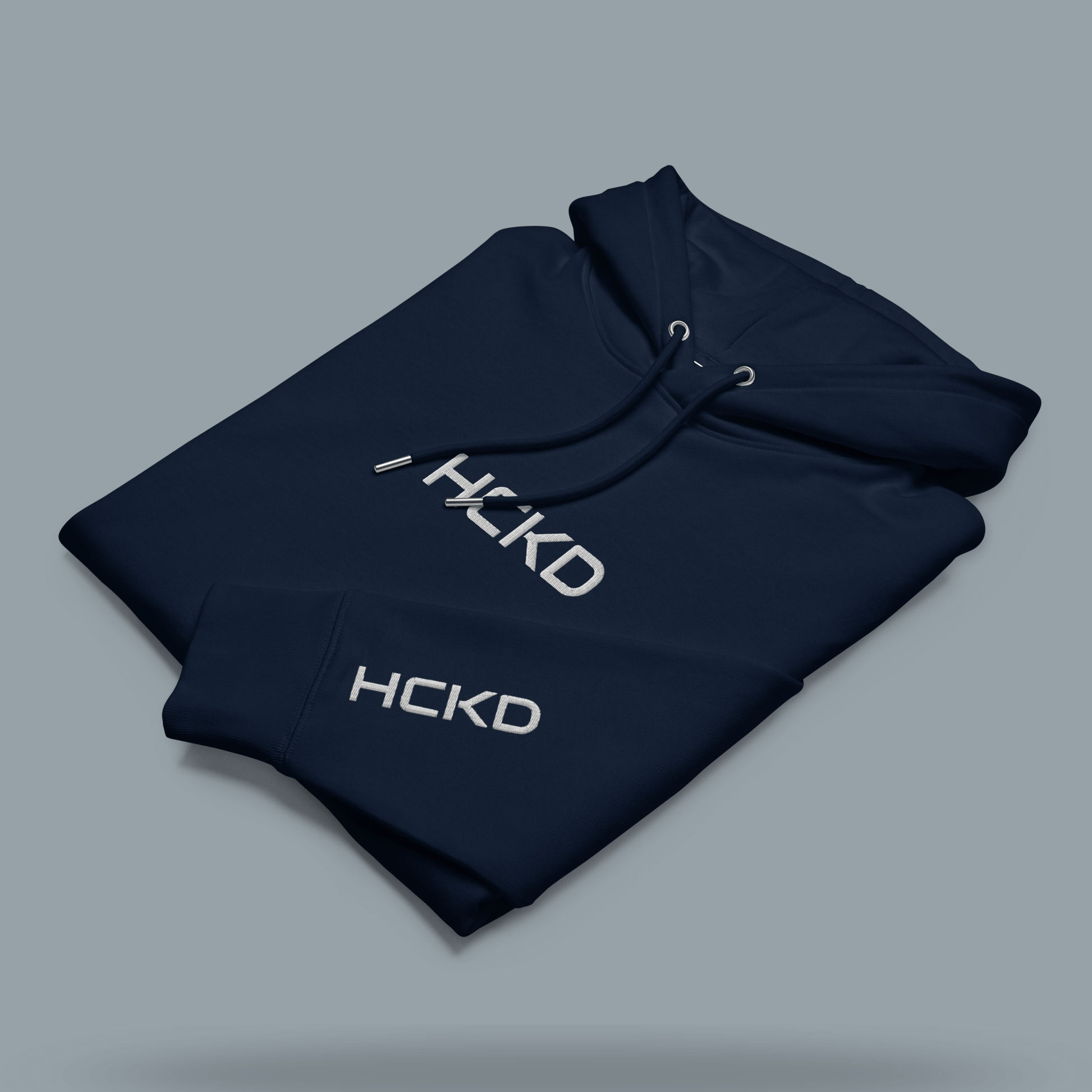 HCKD HOOD-01 hoodie in navy blue, featuring a modern fit, double-layered hood, and stylish logo.