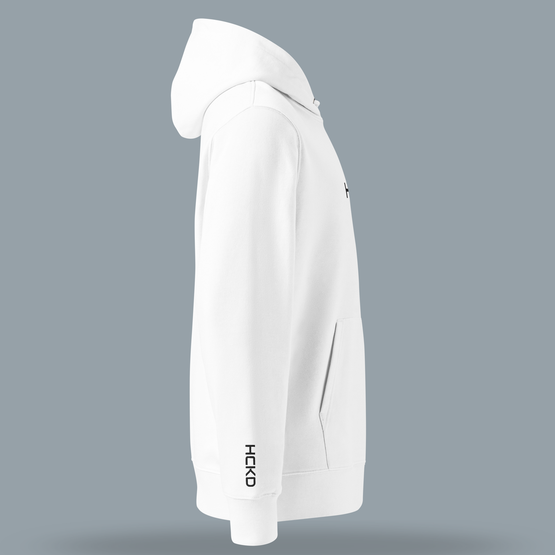 Side view of the HCKD HOOD-01 hoodie in white, showcasing its modern fit and kangaroo pocket.